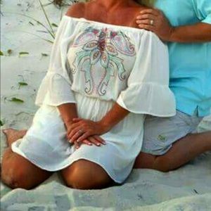 White lined Off the shoulder dress.